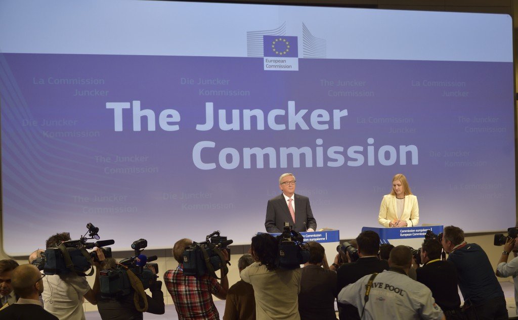 Jean-Claude Juncker, on the left, and Natasha Bertaud, his Spokesperson, in front of the press