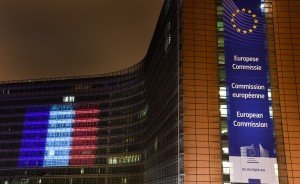 The Berlaymont building illuminated with the colours of the French flag