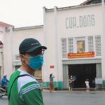 GIOVANE VIETNAMITA CON MASCHERINA
